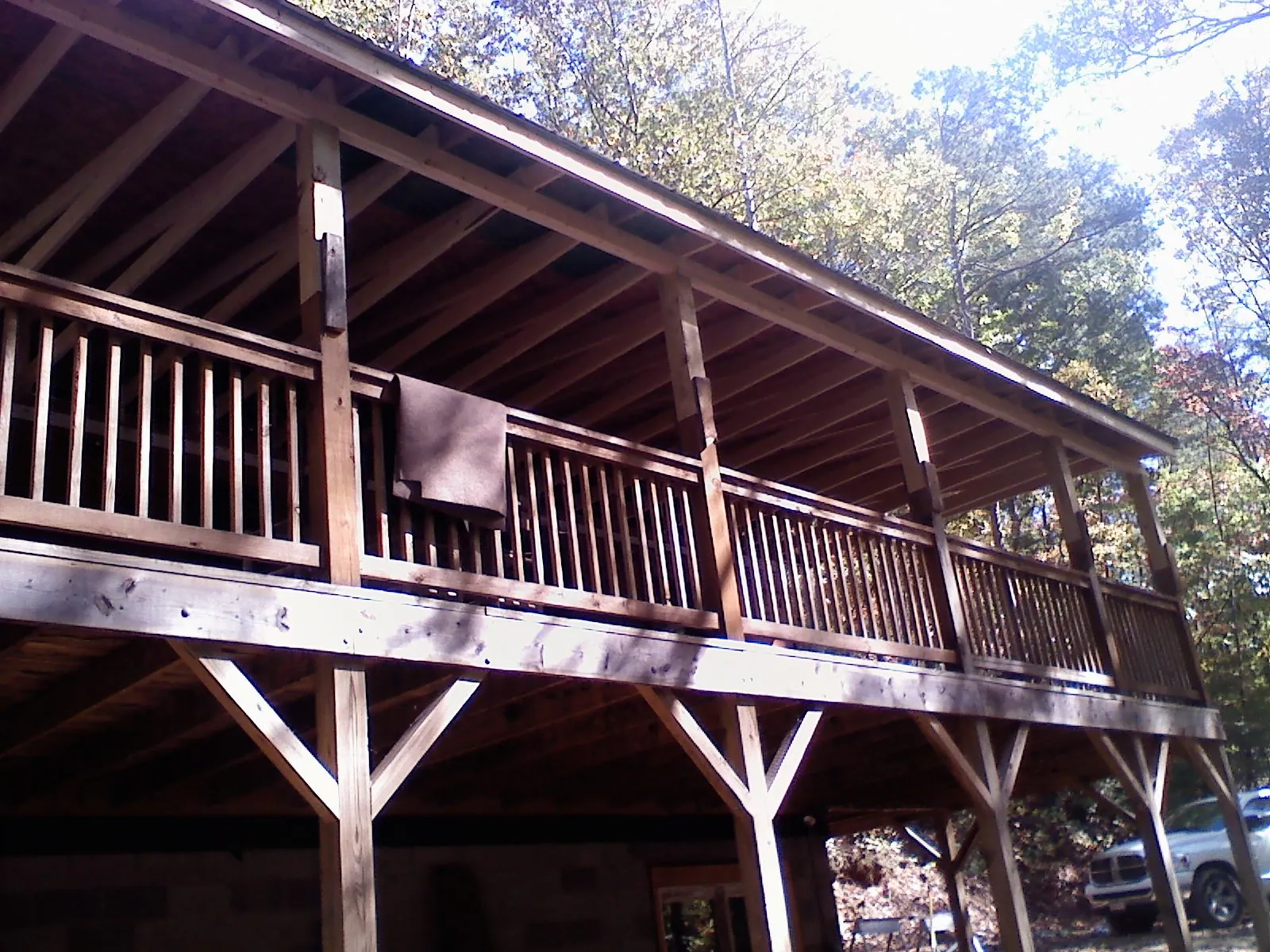 Timber framing under a new elevated porch and deck — Roof Leak Repair in Hanscom Afb by Roofing Brothers